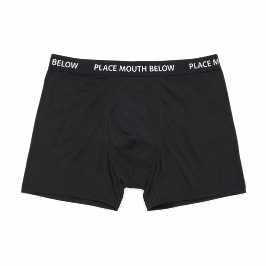 Eternal Black boxer briefs with a black elastic waistband featuring white text that reads 'BELOW PLACE MOUTH BELOW PLACE , Front veiw

